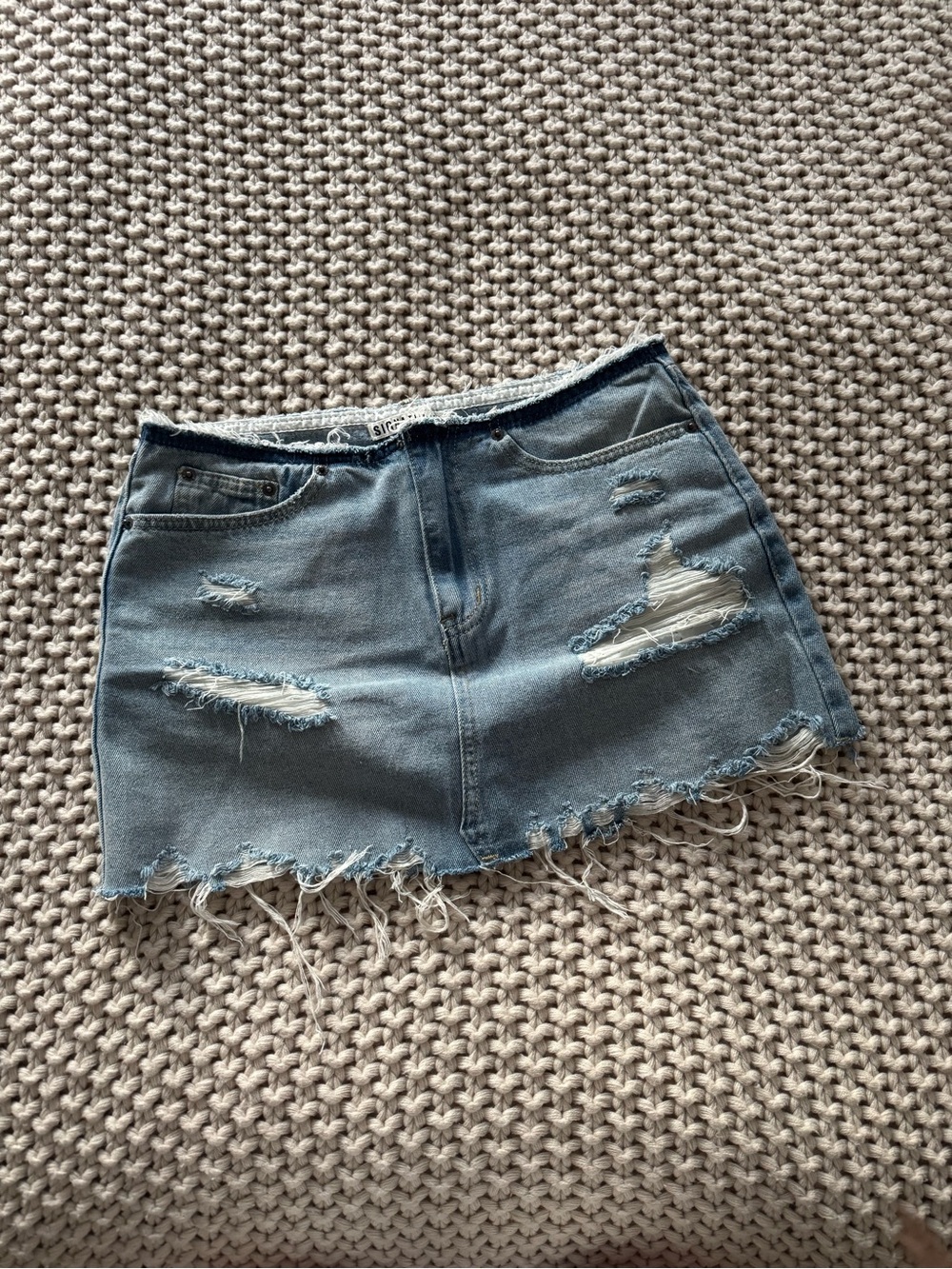 Signature Light Blue Distressed Denim Mini Skirt